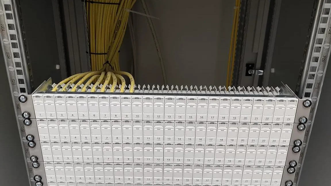 Patch panel with terminated data cables