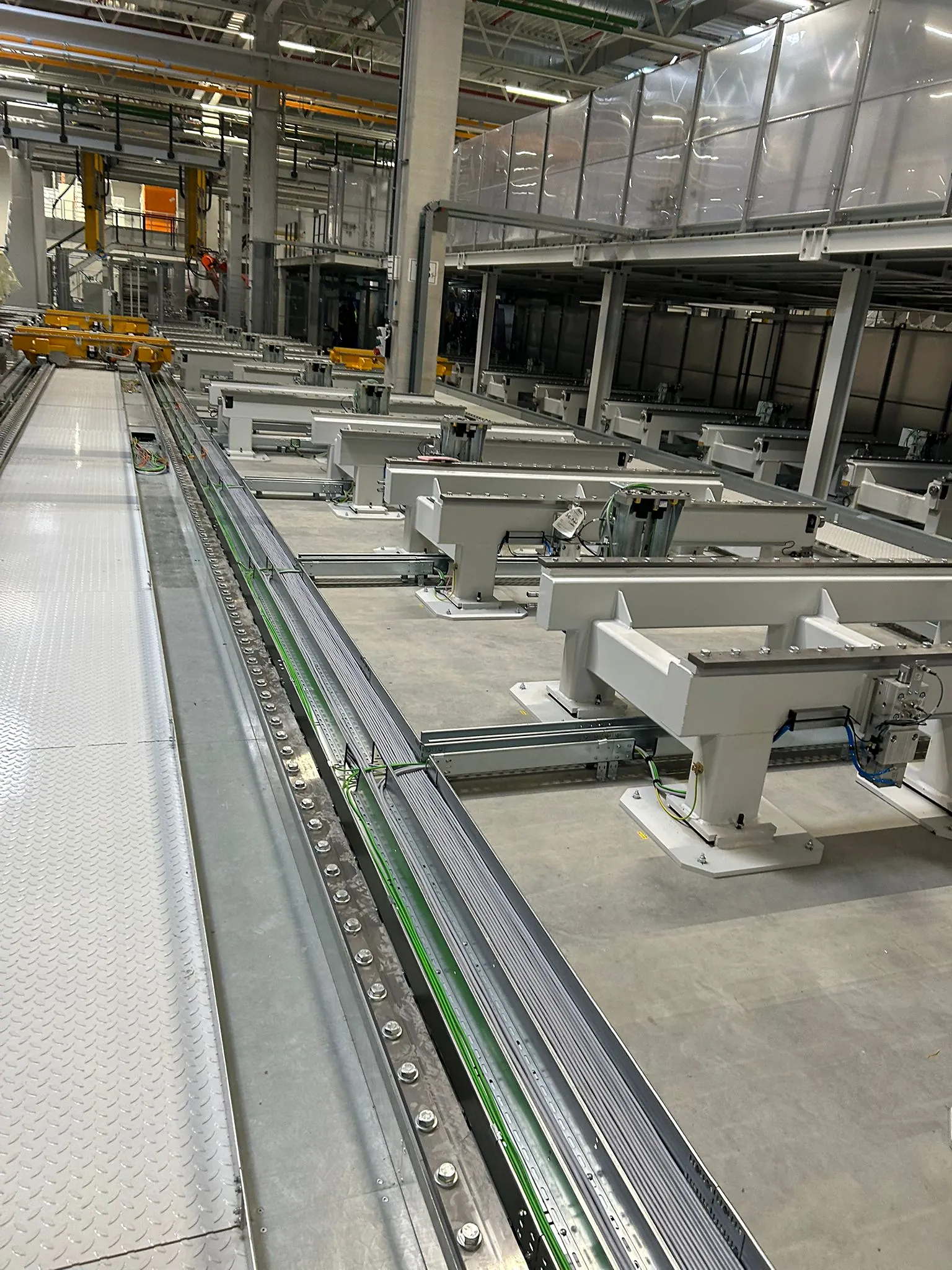 Cable trays with power and data cables on the production floor