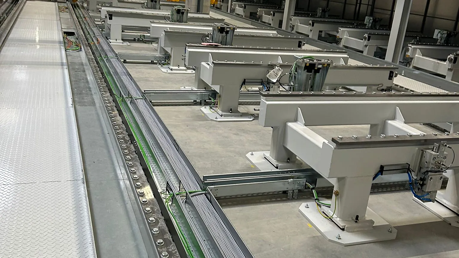 Cable trays with power and data cables on the production floor