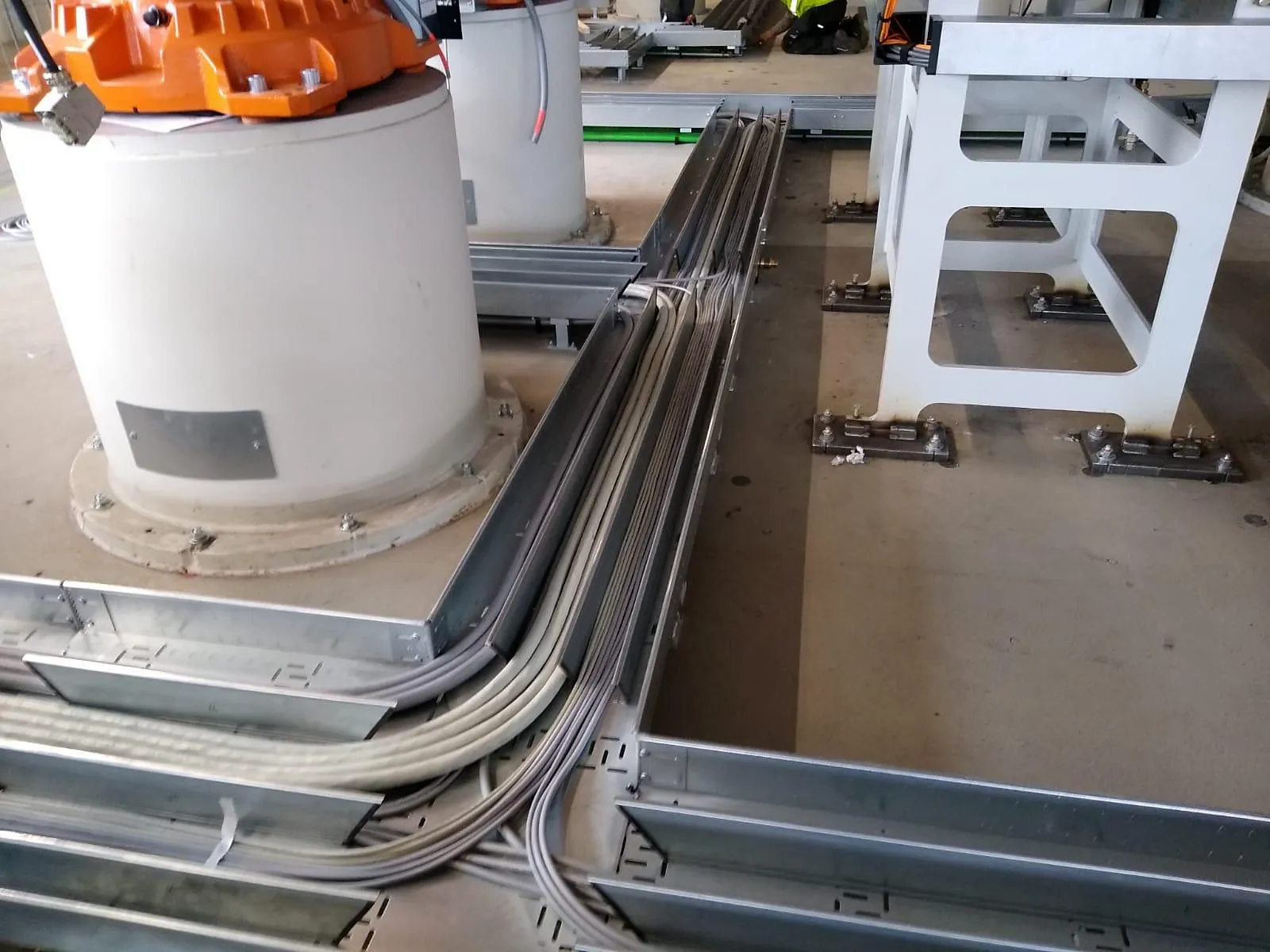 Cable trays with power and data cables on the production floor