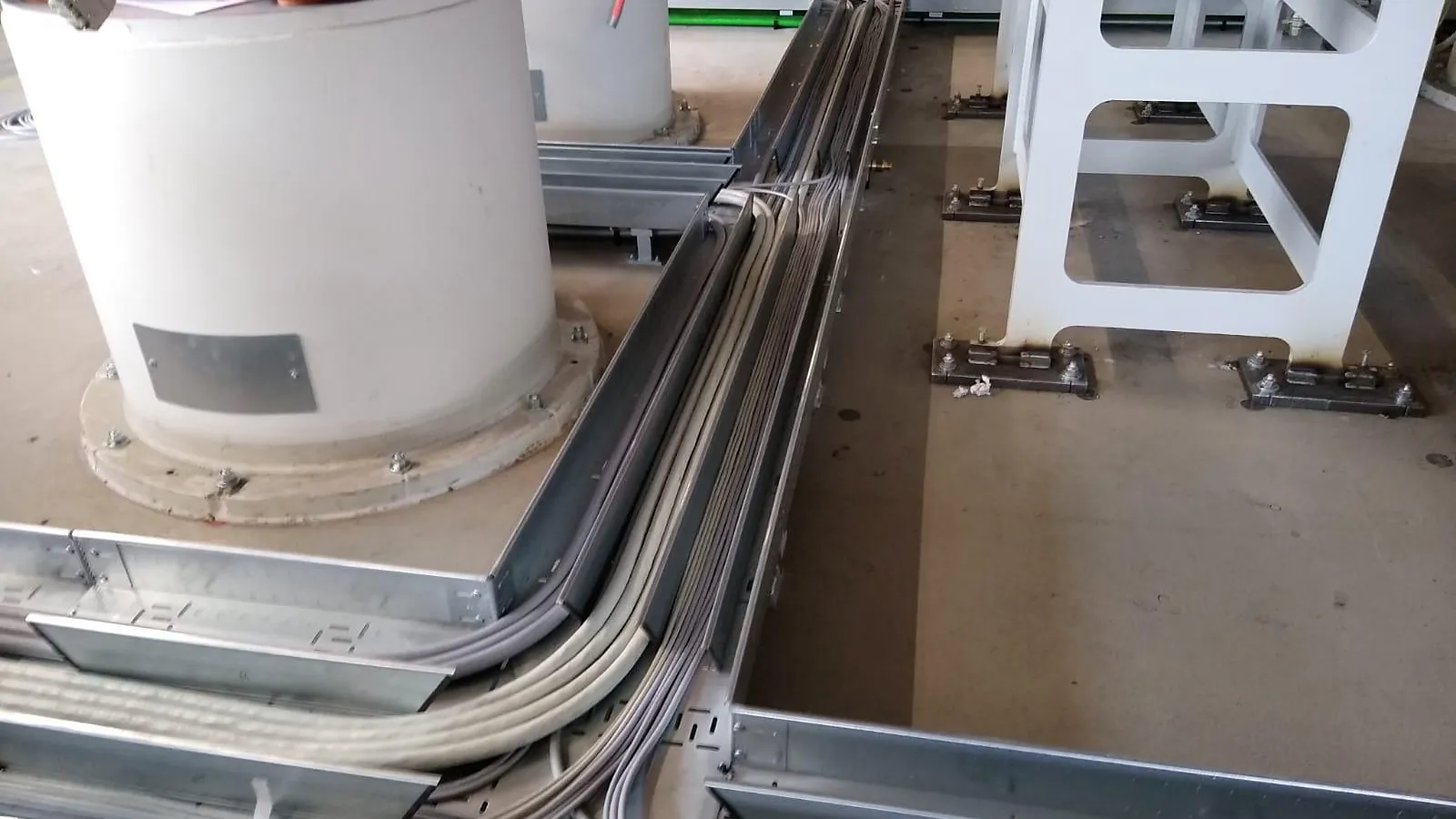 Cable trays with power and data cables on the production floor