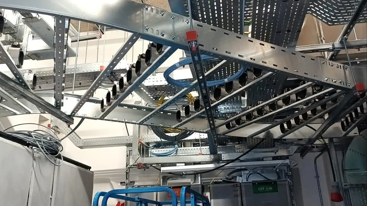 Cable containment above server racks in a data hall