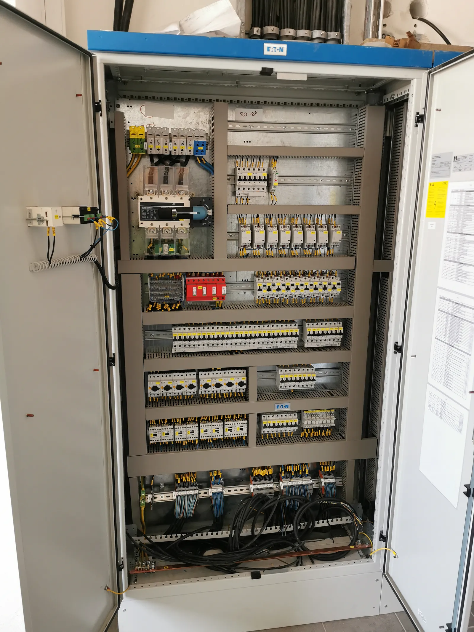 Control cabinet with completed wiring