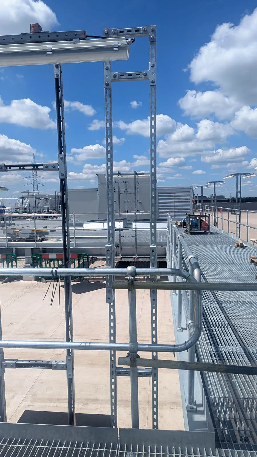 Galvanised cable support structures on an industrial roof